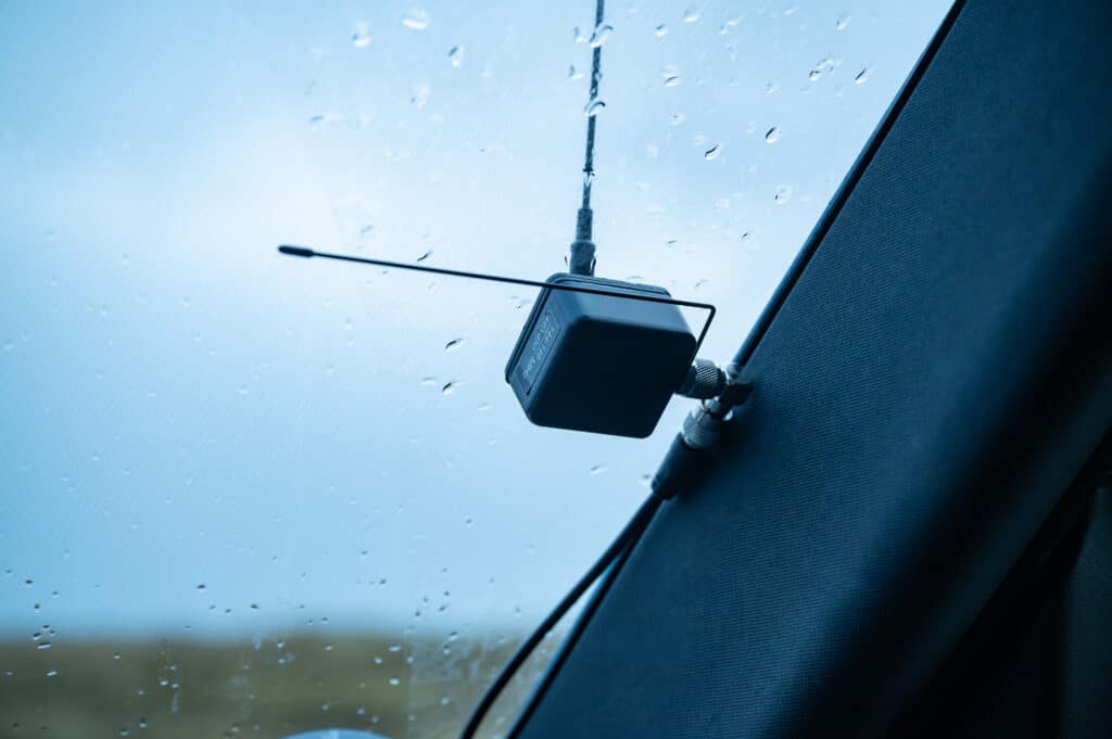 Duo-Band adhesive antenna from WIMO. This antenna can be conveniently sticked to any vehicle windscreen and couples inductively through the windscreen. 